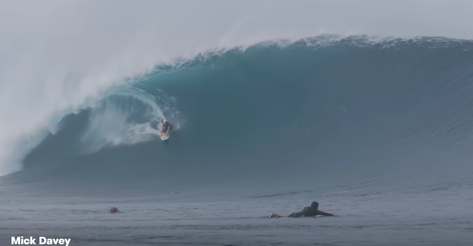 Picture of Mick Davey in the barrel at Cloudbreak, Fiji on his Rusty Surfboard