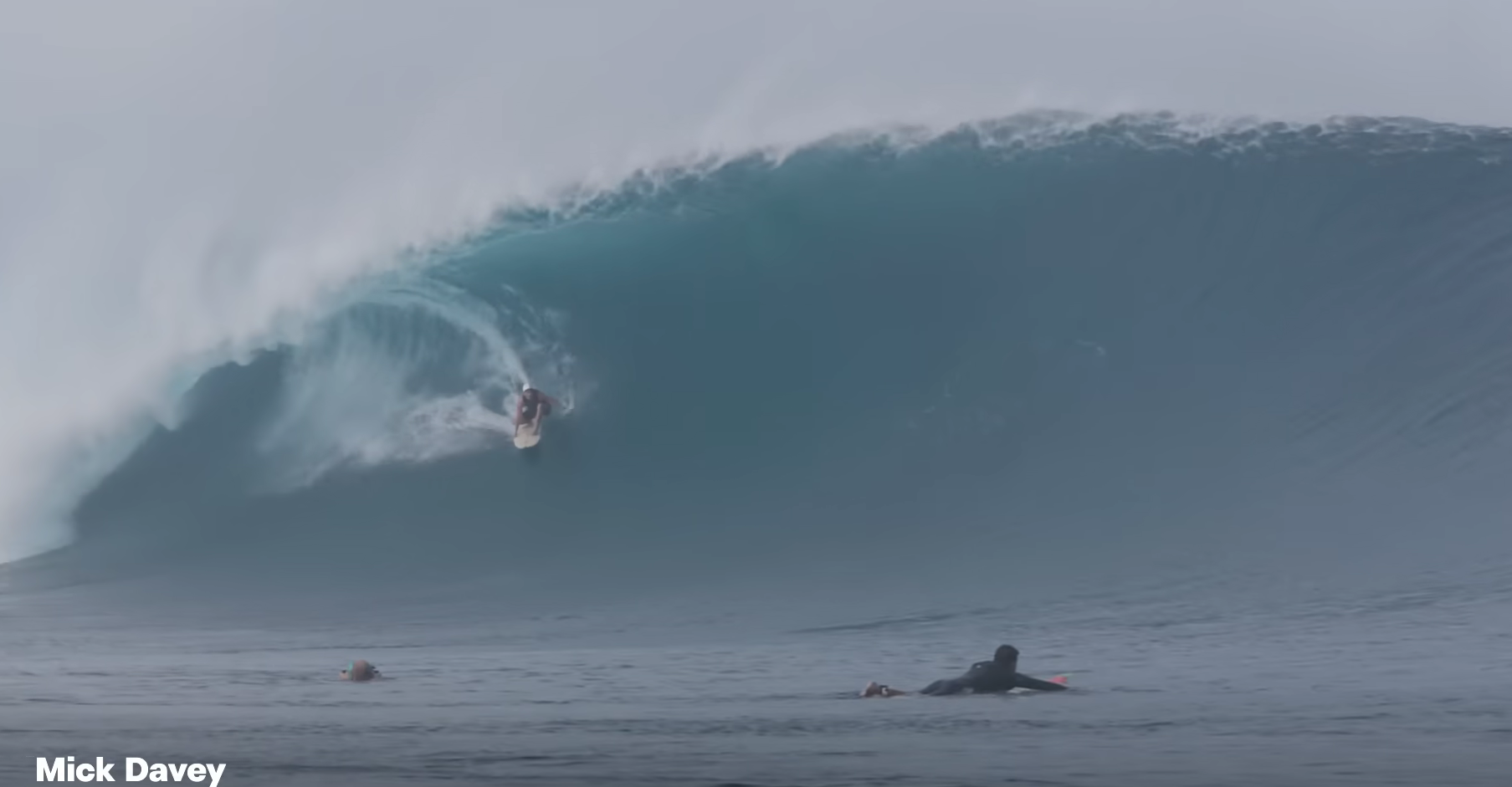 Picture of Mick Davey in the barrel at Cloudbreak, Fiji on his Rusty Surfboard