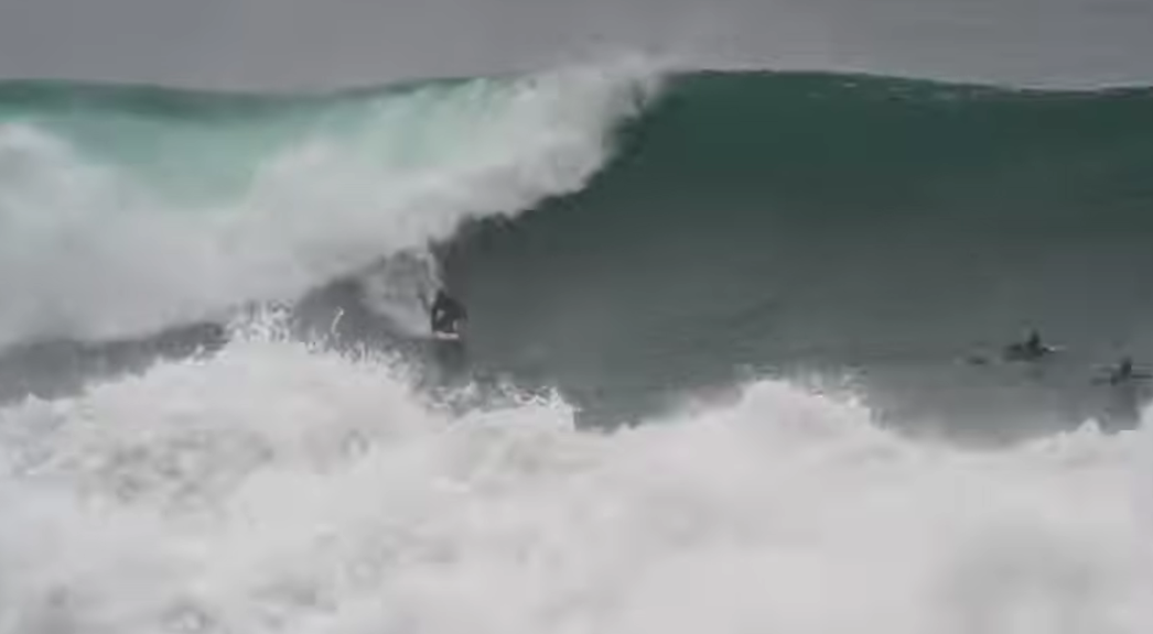 Jacob "Zeke" Szekely charging XXL Blacks Beach in San Diego during 2023/ 2024 El Nino Year