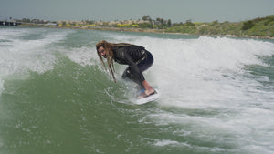 Austin Keen launching an Alley Oop on his signature wakesurf The Pint - Rusty Wakesurf - In Stock
