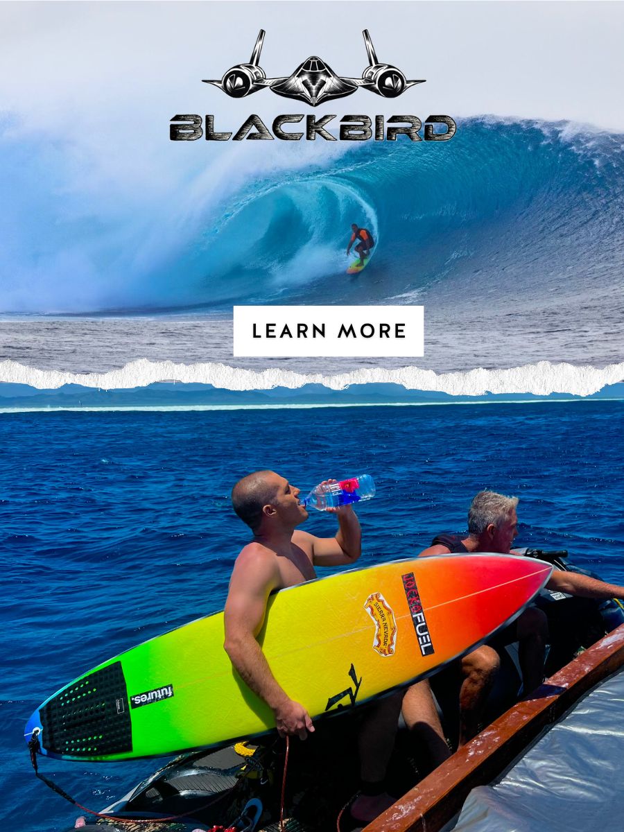 Team rider JoJo Roper holding his Blackbird at Cloudbreak in Fiji - Rusty Surfboards - Mobile