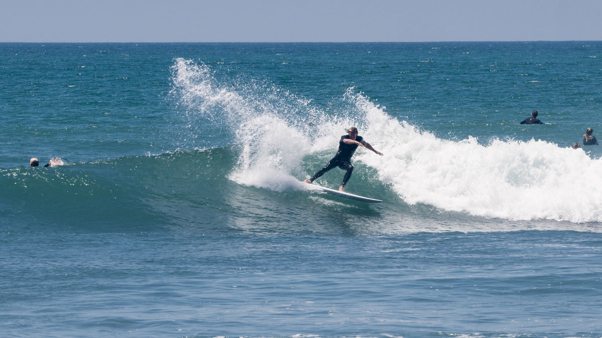 Letty Mortensen riding The Deuce at Lower Trestles in San Clemente, CA.