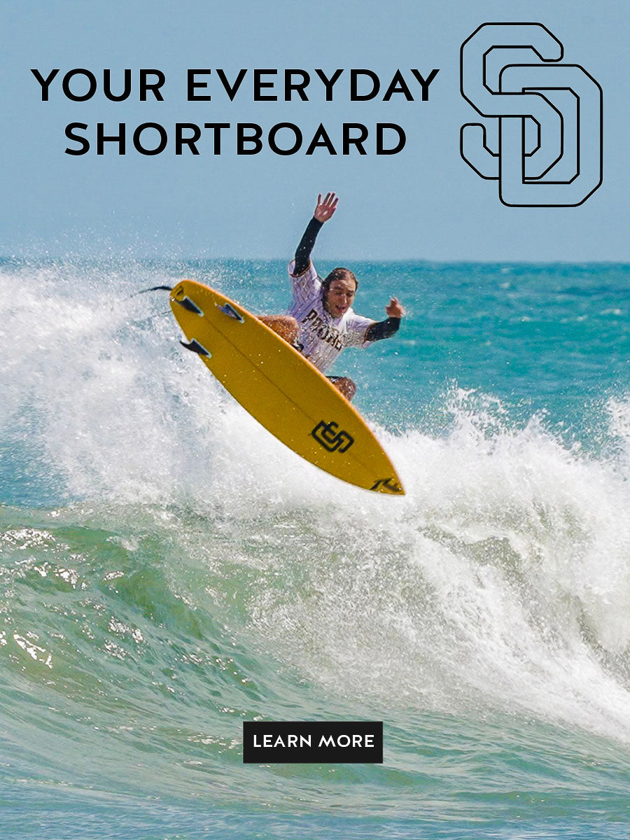 Picture of Jacob Zeke Szekely in the air on his SD Shortboard - Rusty Surfboards - Mobile